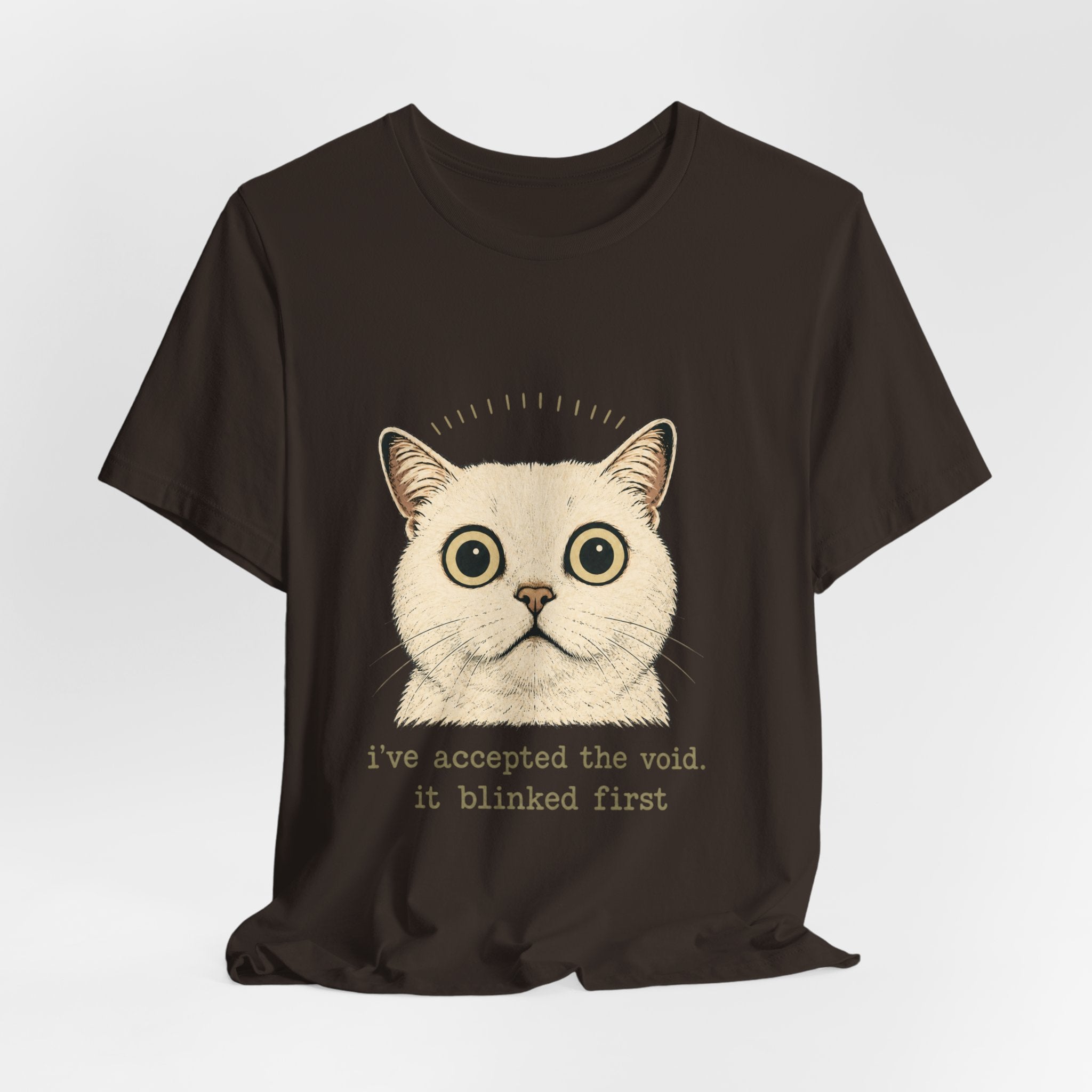 Dark brown Halloween cat T-shirt with funny quote 'i've accepted the void. it blinked first' — perfect spooky cat lover gift